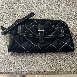 Brand New with tags Vera Bradley Berkeley Clutch Black. 1 inside zip pocket